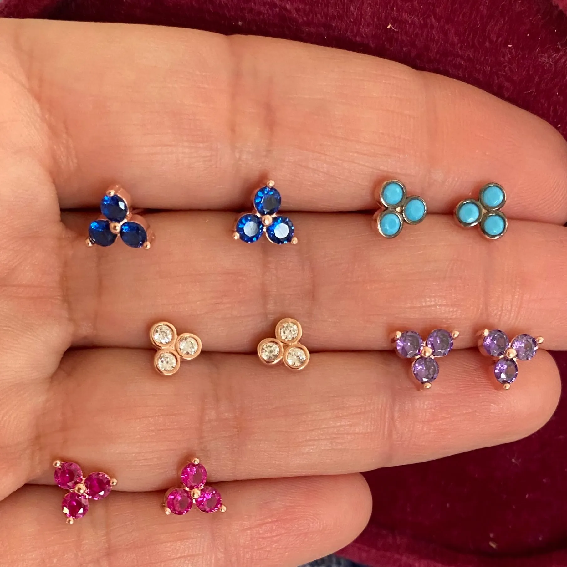 Dainty studs with three stones